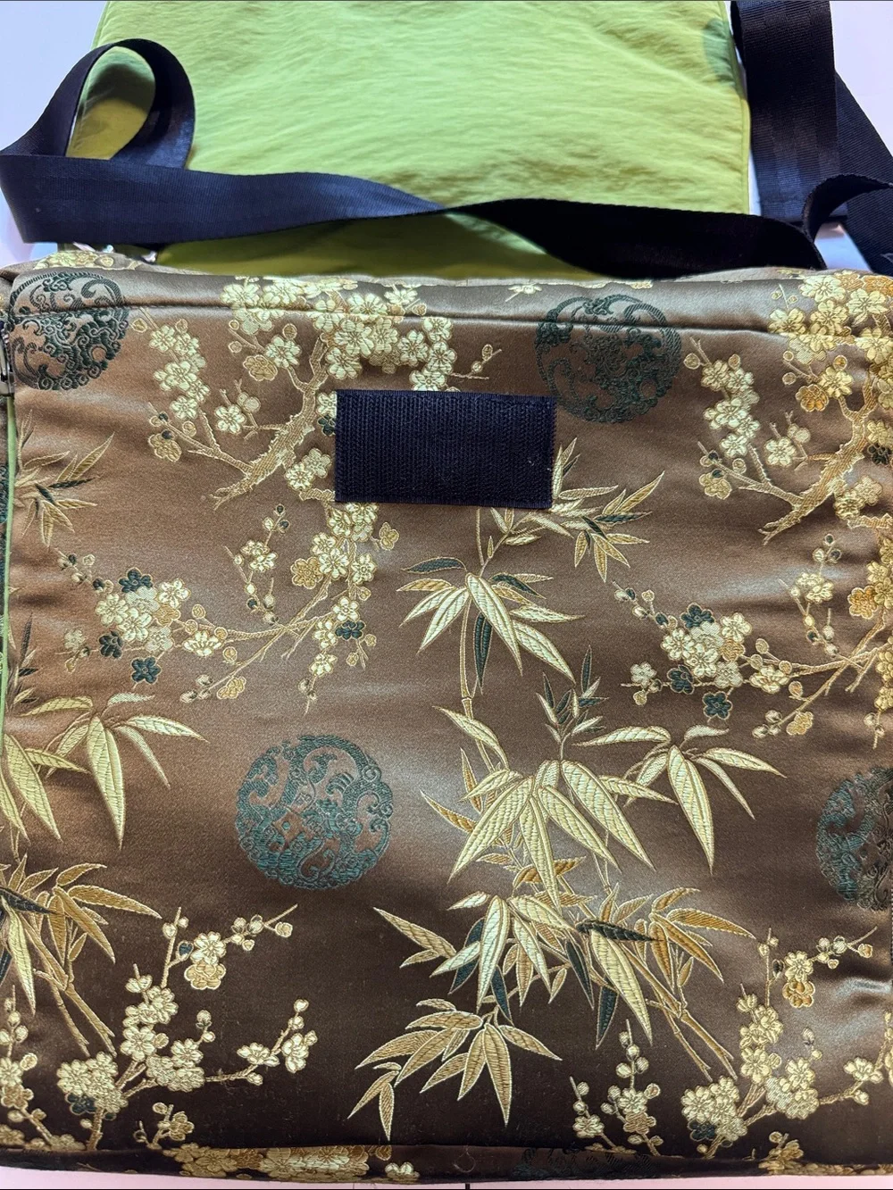 Petunia Pickle Bottom olive and lime floral crossbody diaperbag